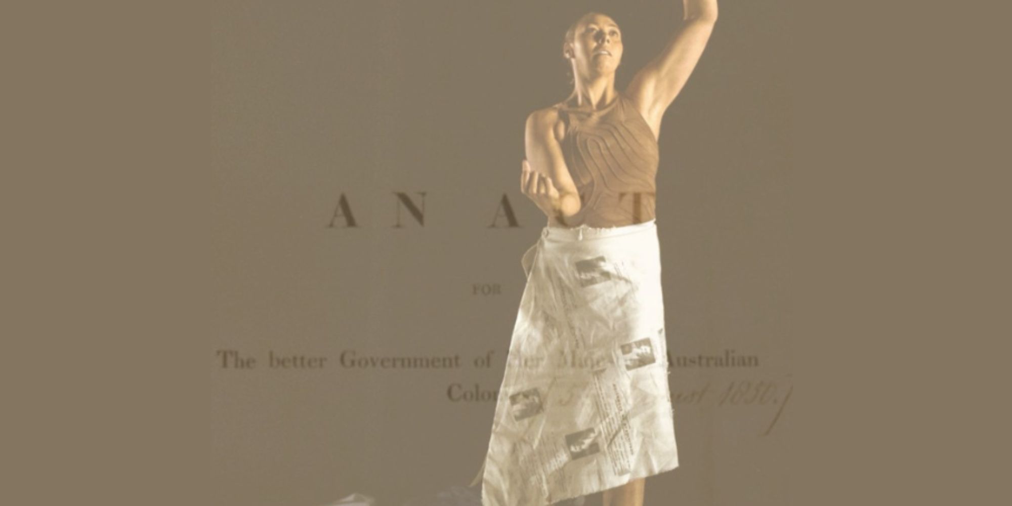Image of person looking to one side with hands and arms framing their face.