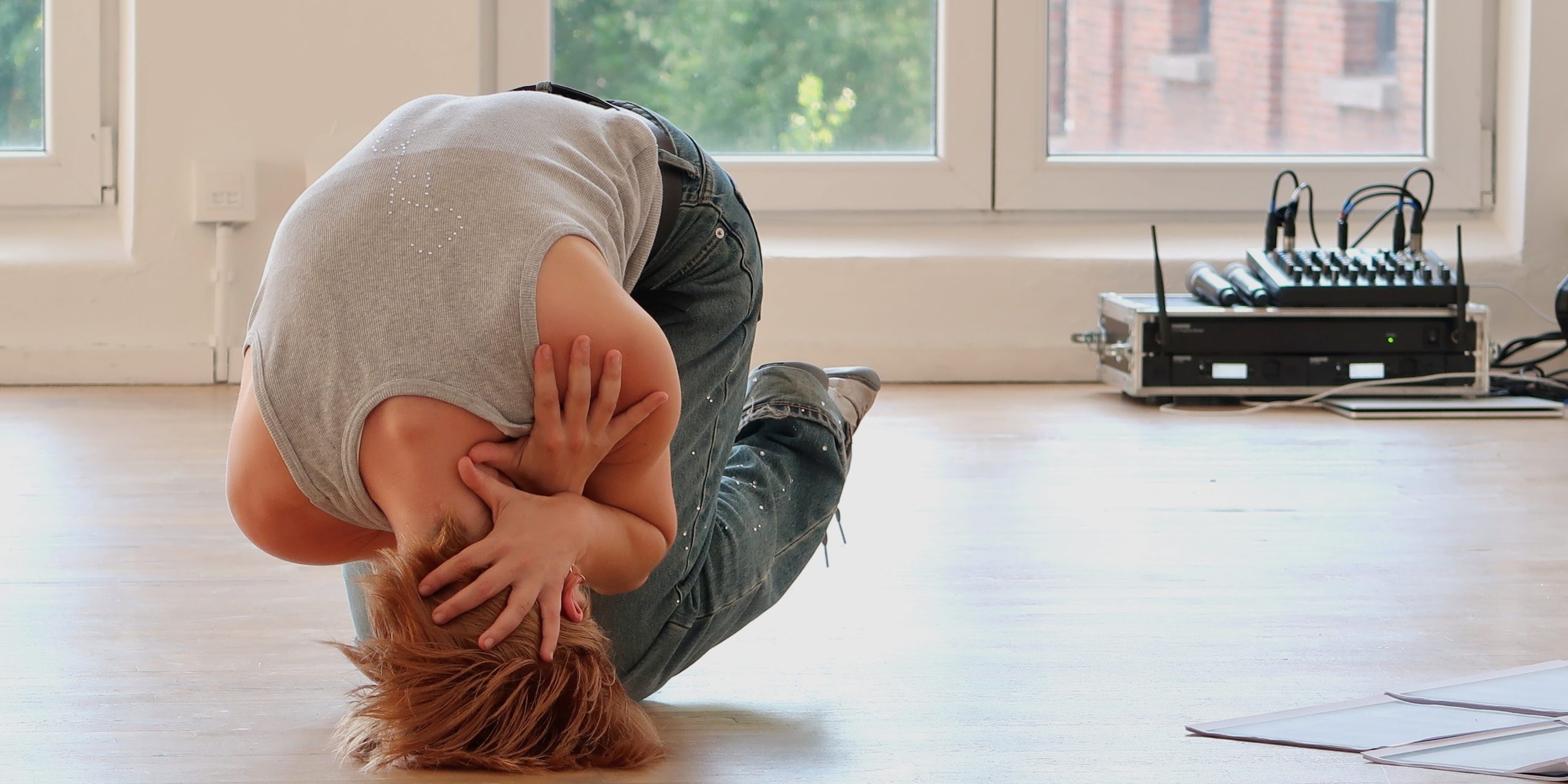 Photo of a person dancing with an anatomical illustration of a human's internal organs attached to the person's clothed torso.